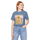 BELLA  CANVAS - Easter Bunny Kneeling at Crosses T‑Shirt — Christian Easter Faith Tee