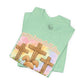 BELLA  CANVAS - Easter Bunny Kneeling at Crosses T‑Shirt — Christian Easter Faith Tee