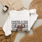 GILDAN - Cougars Cheer Bow Sweatshirt - Repeated Text Graphic Crewneck