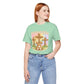 BELLA  CANVAS - Easter Bunny Kneeling at Crosses T‑Shirt — Christian Easter Faith Tee