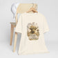 Christian Cow Graphic Tee - "Don't Follow the Herd, Follow the Word" Floral Cross T-Shirt